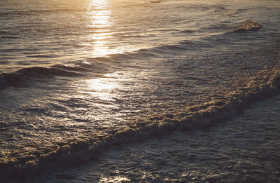 Sea waves in the sunset 