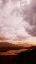 Scenic view of landscape against sky during sunset