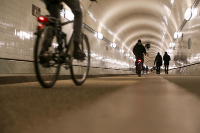 People riding bicycle in city