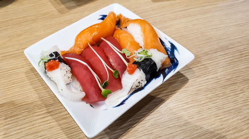 High angle view of sushi served on table