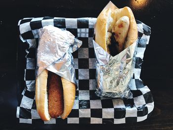 High angle view of hot dog in tray on table