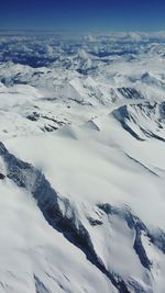 Scenic view of snow covered mountains