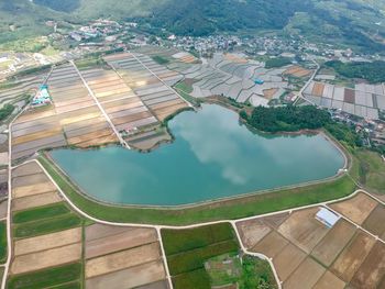 High angle view of swimming pool by lake