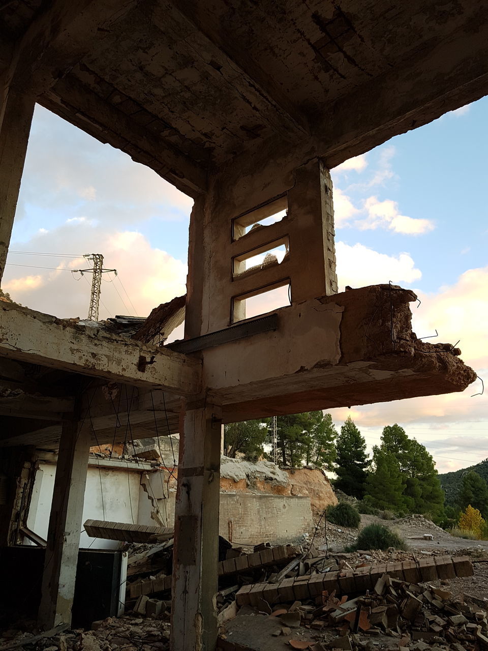 LOW ANGLE VIEW OF ABANDONED BUILDING