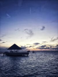 Scenic view of sea against sky at sunset