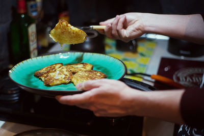 Midsection of woman preparing food