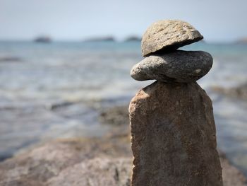 Close-up of stone stack on rock