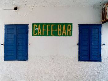 Text on closed door of building