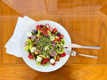 High angle view of salad in plate on table