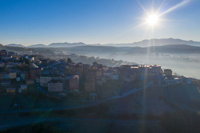 View of buildings in city against sky