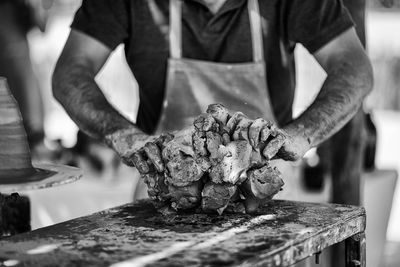 Close-up of man working on table