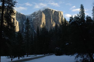 Scenic view of mountains against sky during winter