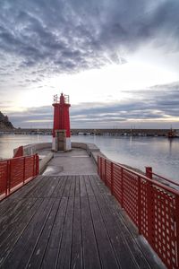 Pier over sea against sky