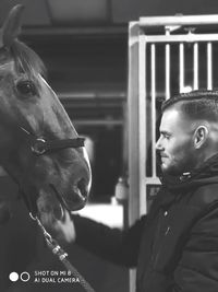 Portrait of man in stable