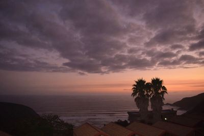 Scenic view of sea against sky at sunset