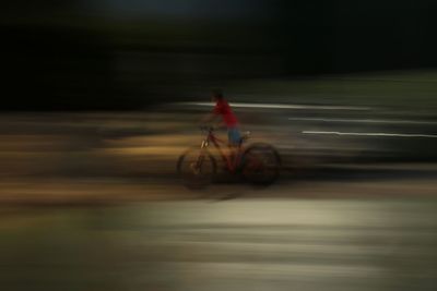 Man cycling on street