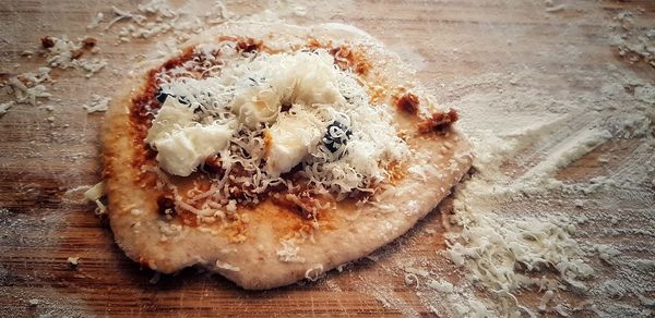 High angle view of bread on cutting board