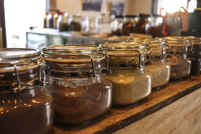 Close-up of glass jar on table