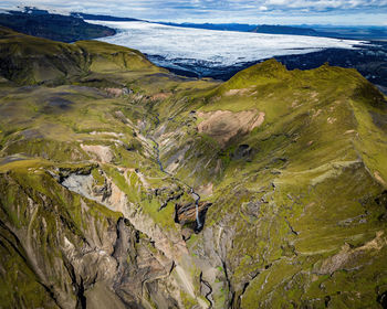 Scenic view of sea against mountain