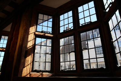 Low angle view of glass window in building