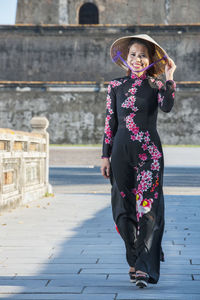 Beautiful woman at the imperial fortress in hue / vietnam