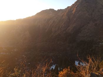 Scenic view of mountains against sky during sunset