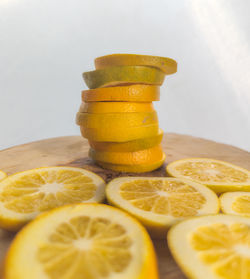 Close-up of lemon slices against white background