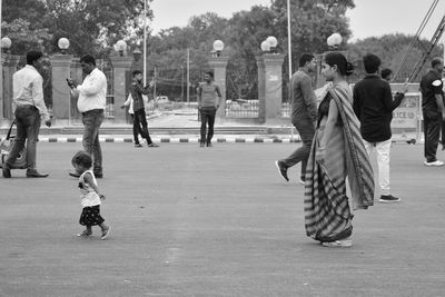 People walking on zebra crossing