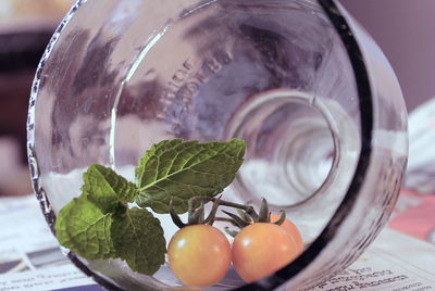Close-up of cherry tomatoes in glass