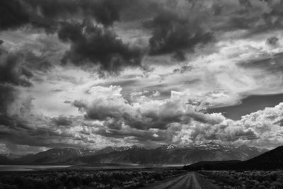 Scenic view of storm clouds over land