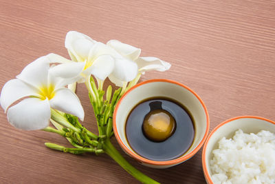 Close-up of orchids in bowl