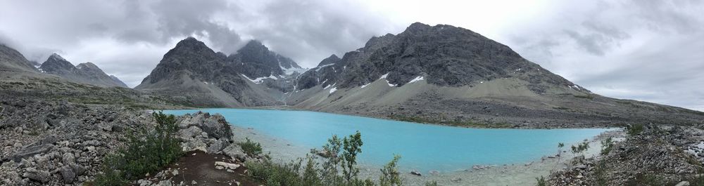 Panoramic view of lake and mountains against sky