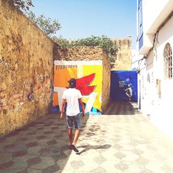 Rear view of woman walking in city