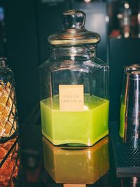 Close-up of drink in glass jar on table