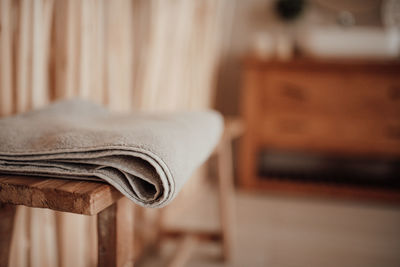 Close-up of towels on bed at home