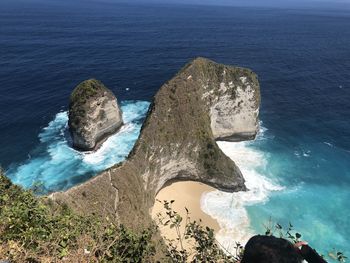 High angle view of rocks in sea