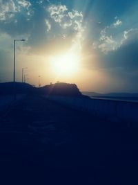 Scenic view of silhouette landscape against sky during sunset