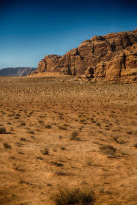 Rock formations in desert against sky