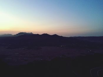 Scenic view of mountains at sunset