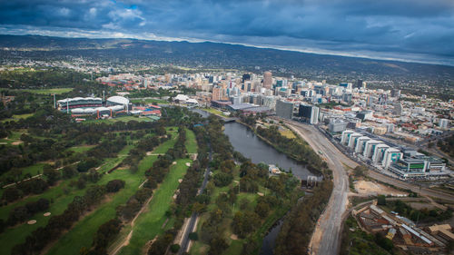 High angle view of buildings in city against sky