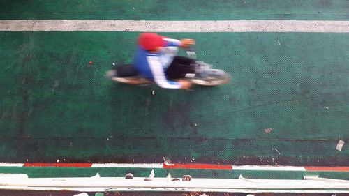 High angle view of person riding motorcycle