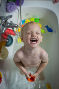 Cute baby boy in bathroom