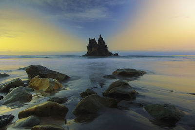 Scenic view of sea against sky during sunset