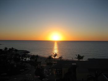 Scenic view of sea at sunset