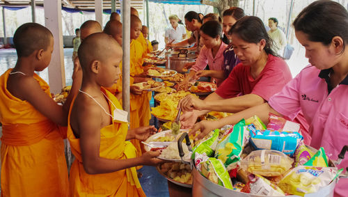 Women standing in a traditional clothing