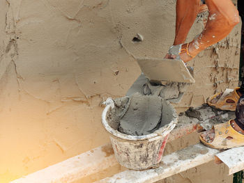 Man working on wall