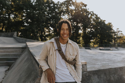 Smiling teenage boy looking at camera