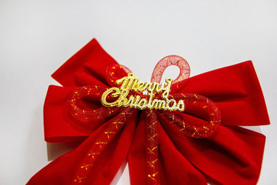 Close-up of red flower on white background