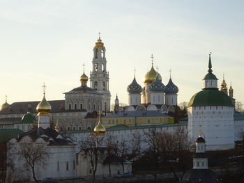 View of buildings in city against sky