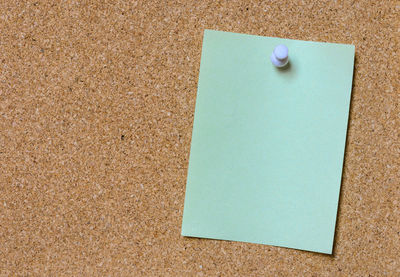 High angle view of paper on table